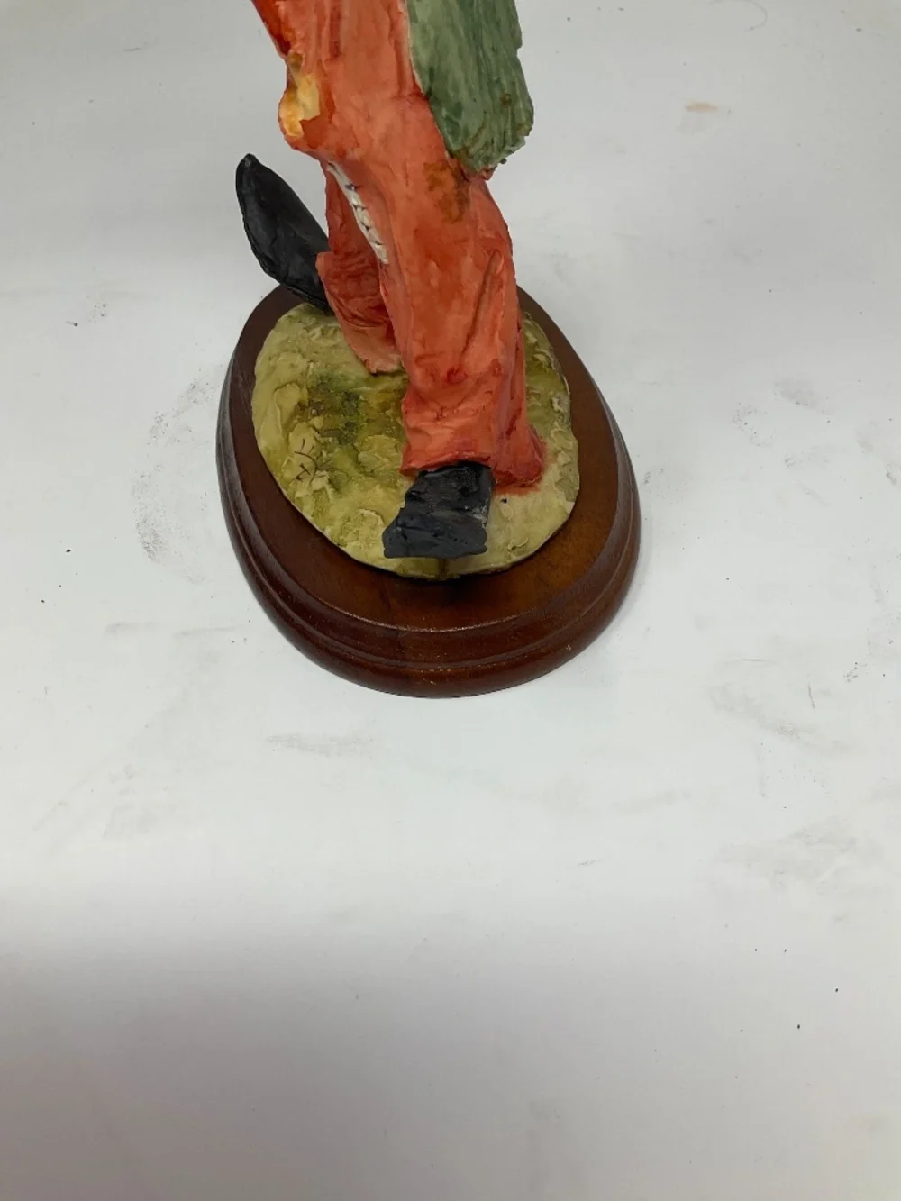 Vintage hobo clown paying trumpet. H289